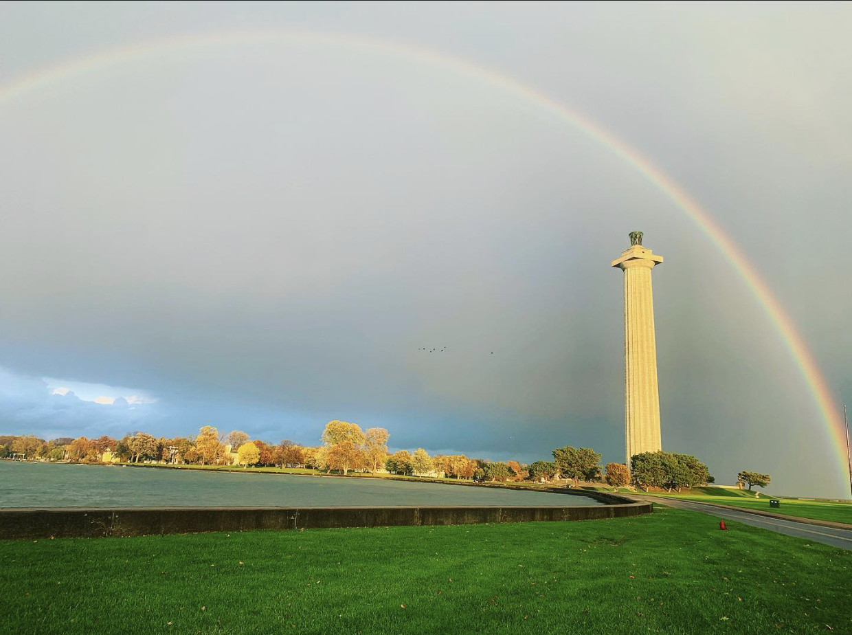 Put-in-Bay 2021 - A photo of the monument and rainbow